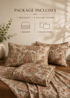 A bedding set displayed on a wooden surface with three patterned pillowcases and a matching folded bedsheet. Text at the top reads 'PACKAGE INCLUDES 1 BEDSHEET + 2 PILLOW COVERS' with simple line drawings.